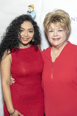 Arasi, Candace Rice-Henderson 23 Aralık 2018 'de Los Angeles, Kaliforniya' daki The Federal Bar 'ın çatısında Arasi' nin AP Yayıncılık Partisi 'ne katıldı.