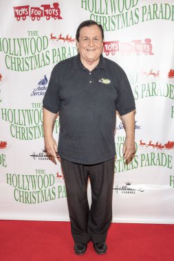 Burt Ward, 26 Kasım 2017 'de Hollywood, Kaliforniya' da düzenlenen Deniz Oyuncakları Vakfı için düzenlenen 86. Hollywood Noel Geçidi 'ne katıldı.