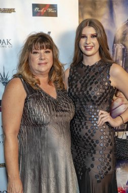 Annette Cama, Angelina Danielle Cama 26 Eylül 2018 'de TCL Çin Tiyatrosu' ndaki Los Angeles galasına katıldı.