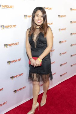 April Cao INFOList.com Kırmızı Halı Yeniden Başlatma Partisi ve Holiday Extravaganza 'ya katıldı! 5 Aralık 2018 'de Los Angeles, Kaliforniya' daki Mondrian Oteli 'nde.