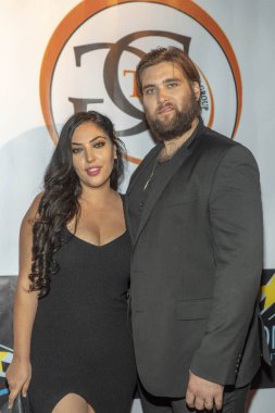 Hila ve Weston Cage Coppola, 30 Eylül 2018 'de Alex Theatre, Glendale, Kaliforniya' da düzenlenen 2. Yıllık HAPAWARDS, Hollywood ve Afrika Prestijli Ödüllerine katıldılar.