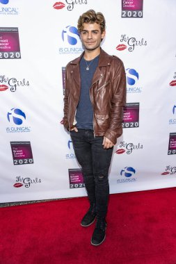 Garrett Clayton attends 18th Annual Les Girls  at The Historical Adobe at Avalon Hollywood, Hollywood, California on October 7th, 2018 clipart
