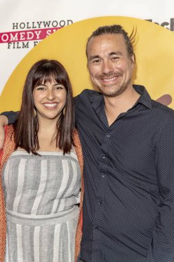 Kira Kalush ve Eric Martig 20 Nisan 2019 'da TCL Çin Tiyatrosu 6, Hollywood, CA' da düzenlenen 2019 Hollywood Kısa Komedi Film Festivali 'ne katıldı.
