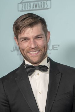Liam McIntyre, 16 Şubat 2019 'da Novo Theatre, Los Angeles' ta 2019 Makyaj Sanatçısı ve Kuaför Loncası Ödüllerine katılıyor.