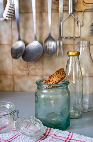 concept zero waste kitchen ,recycled glass jar and bottle. background.