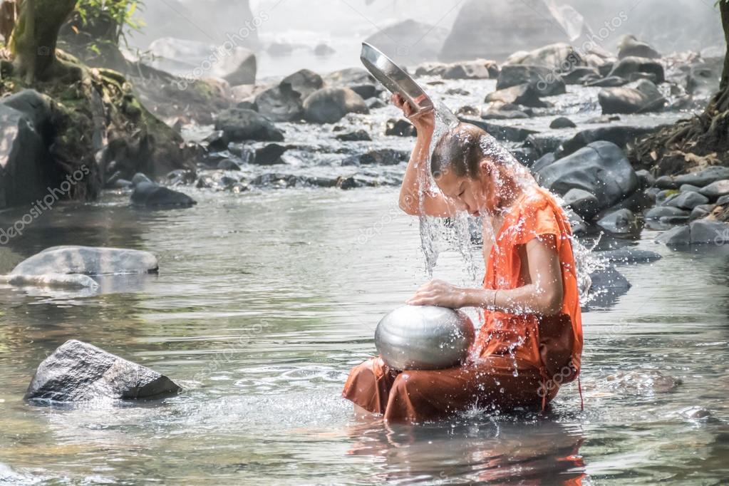 Monk take a bath Stock Photo by ©NJPhoto 128214548