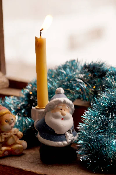 Support under a candle in the form of Father Frost — Stock Photo, Image