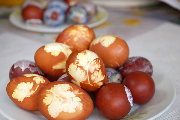 Colored Easter eggs with drawing of a leaf of parsley