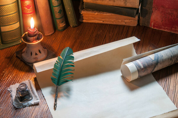 Quill pen by candle light