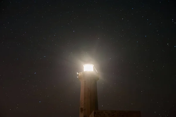 Faro en la noche — Foto de Stock