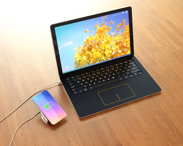 Smartphone on a wireless charging pad — Stock Photo, Image