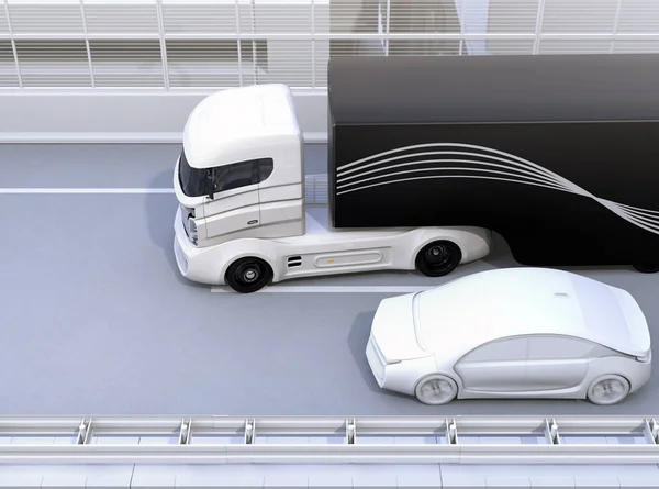 Commercial truck trying change lane and a sedan car on truck's blind spot position — Stock Photo, Image