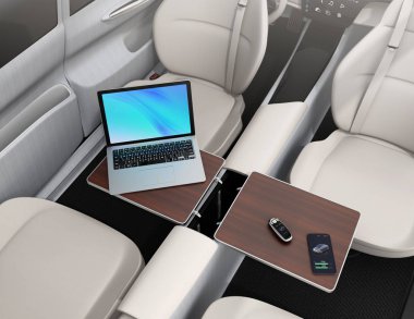 Kendi kendine sürüş araba iç. Akıllı araba anahtar, smartphone, masanın üstünde laptop