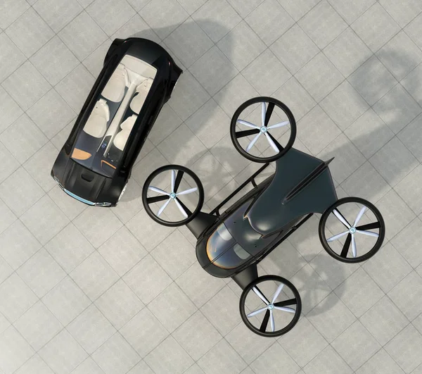 Top view of self-driving car and passenger drone parking on the ground — Stock Photo, Image