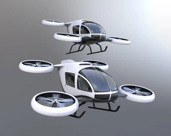 Two self-driving passenger drones flying in the sky — Stock Photo, Image