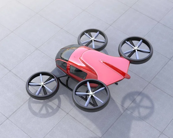Visão traseira do drone de passageiro vermelho com direção automática no chão — Fotografia de Stock