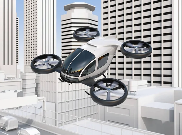 Self-driving passenger drone flying over a highway bridge which in heavy traffic jam — Stock Photo, Image