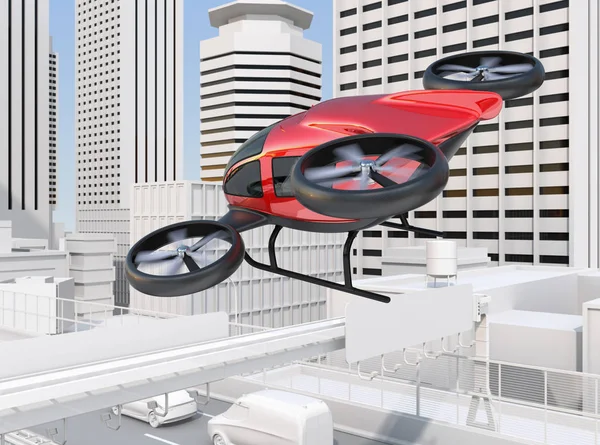 Metalen rode zelf-rijdende personenauto drone vliegen over een snelweg overbruggen die in zwaar verkeer jam — Stockfoto