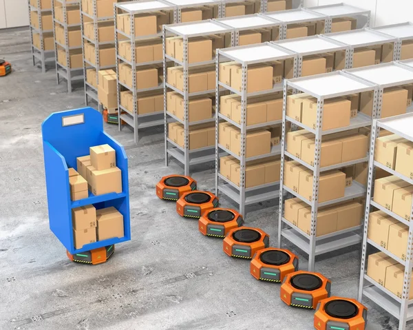 Orange robot bärare parkering nära hyllor i moderna lager — Stockfoto