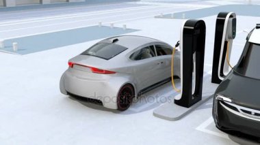 Şarj istasyonu şarj elektrik teslim minivan ve gümüş sedan. 3D render animasyon.