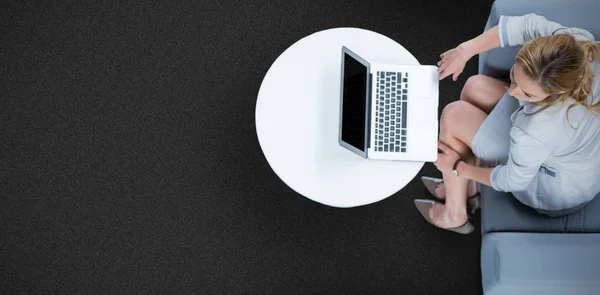 Woman using her laptop — Stock Photo, Image