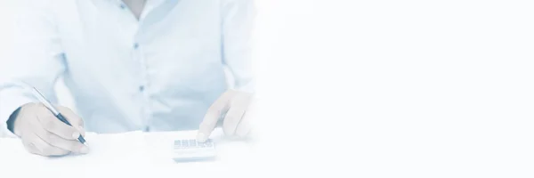 Man with bills and calculator — Stock Photo, Image