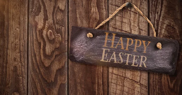 Saludo de Pascua contra los paneles de madera —  Fotos de Stock