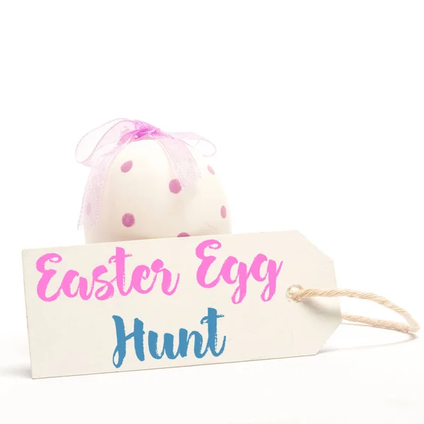 Blank tag in front of easter egg — Stock Photo, Image