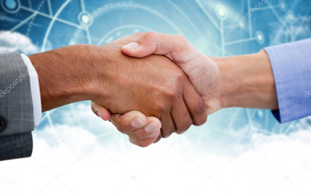 Male colleagues shaking hands 