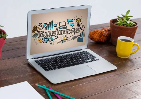 Computer on table showing business doodles — Stock Photo, Image