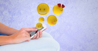 eller üzerinde uçan emojis 