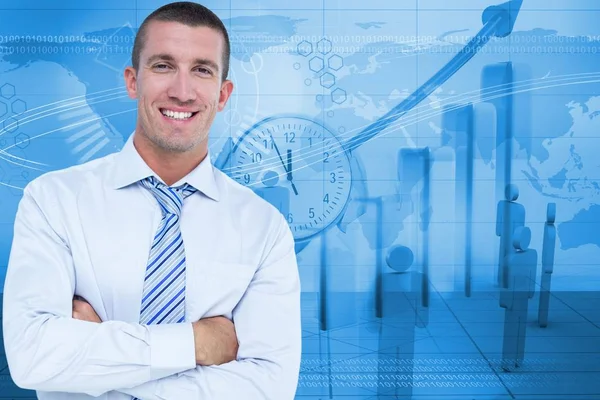 Portret van zakenman staande armen gekruist tegen grafische achtergrond — Stockfoto