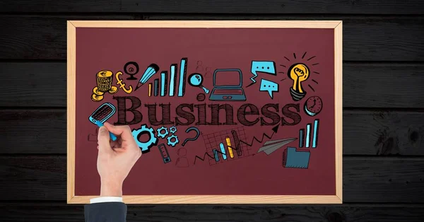 Woman drawing business icons on board — Stock Photo, Image