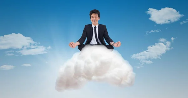 Složený obraz podnikatel na cloud — Stock fotografie