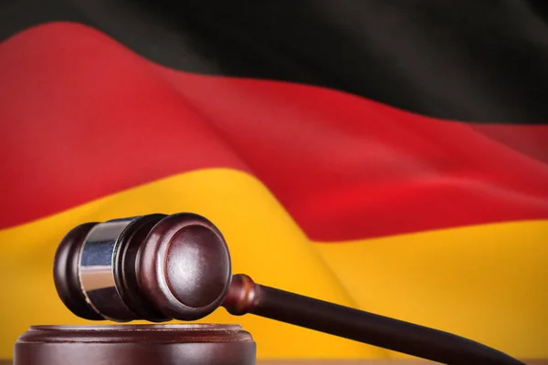 Hammer and gavel against national flag — Stock Photo, Image