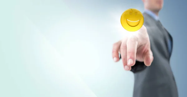 Uomo d'affari che punta emoji con bagliore sullo sfondo blu — Foto Stock