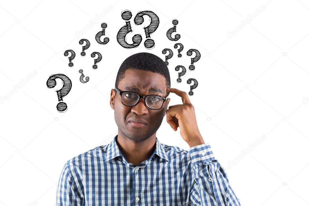 Digital composite image of confused businessman with question marks