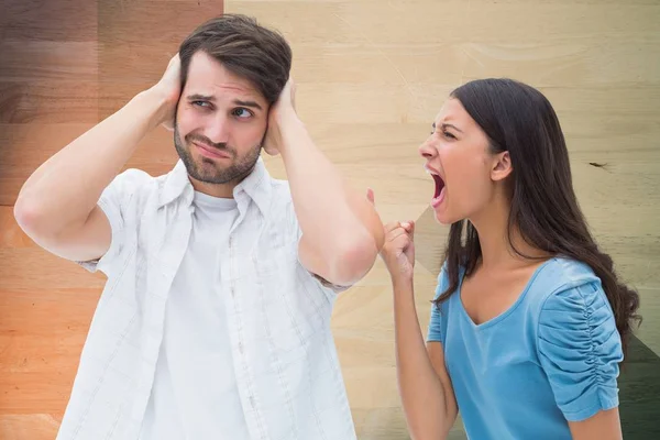 Woman shouting on man while fighting at home — Stock Photo, Image