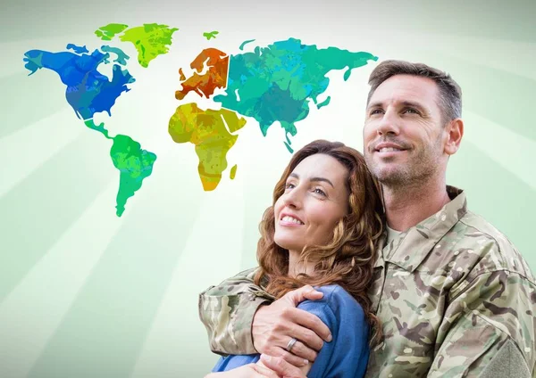 Couple in front of Colorful Map — Stock Photo, Image