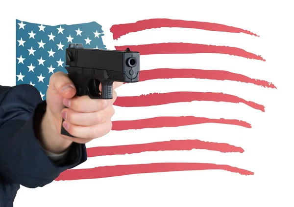 Hand holding gun with American flag — Stock Photo, Image