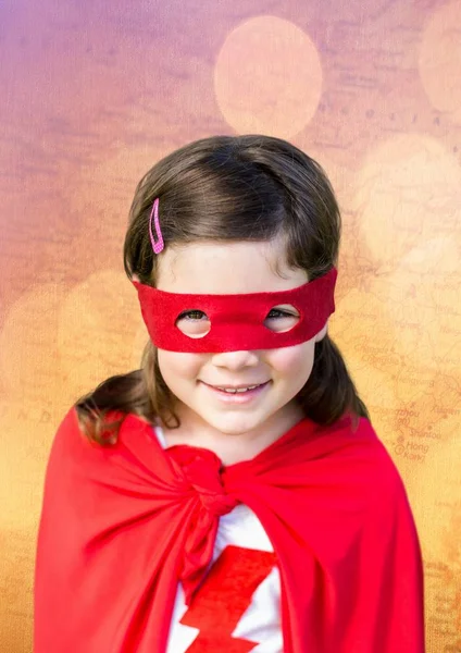 Menina super-herói contra mapa com bokeh — Fotografia de Stock