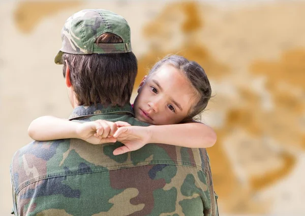 Soldier and daughter against blurry brown map — Stock Photo, Image