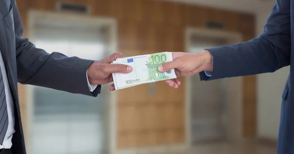 Handen met geld vertegenwoordigen corruptie concept — Stockfoto