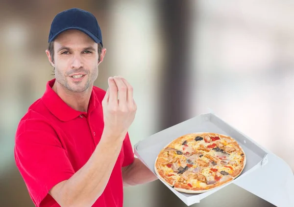 Composite numérique de Deliveryman avec pizza — Photo