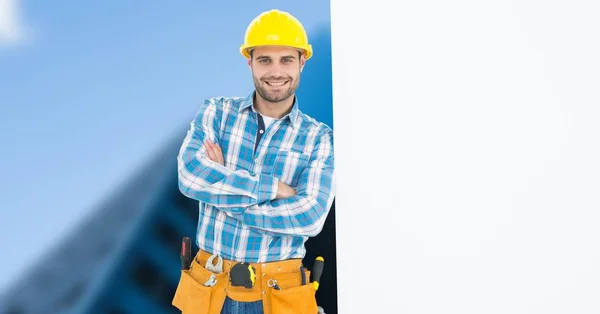 Carpenter leaning on blank bill board — Stock Photo, Image