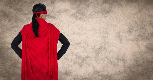 Businesswoman superhero with hands on hips — Stock Photo, Image