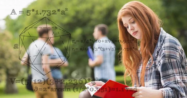 Female student reading book with math equations — Stock Photo, Image