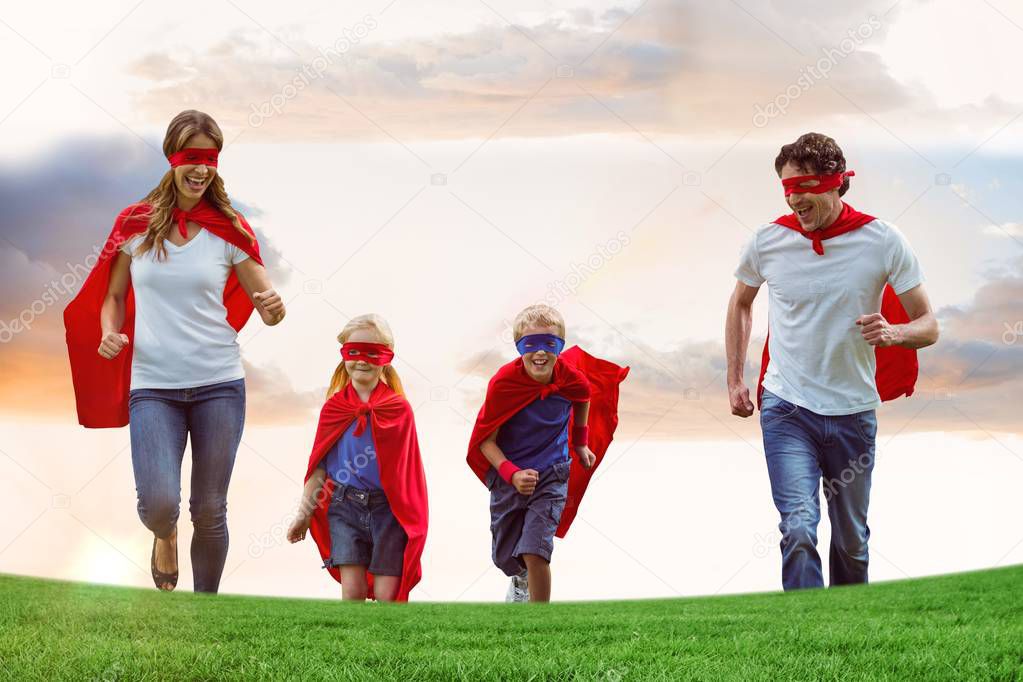 Family wearing capes and eye masks 
