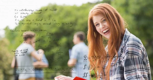 Fêmea feliz com equações matemáticas — Fotografia de Stock