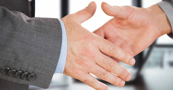 Close-up of handshake in office — Stock Photo, Image